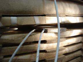 Picture after the spacer with probe (in this picture two probes are installed into a single spacer) is inserted into the transformer winding.